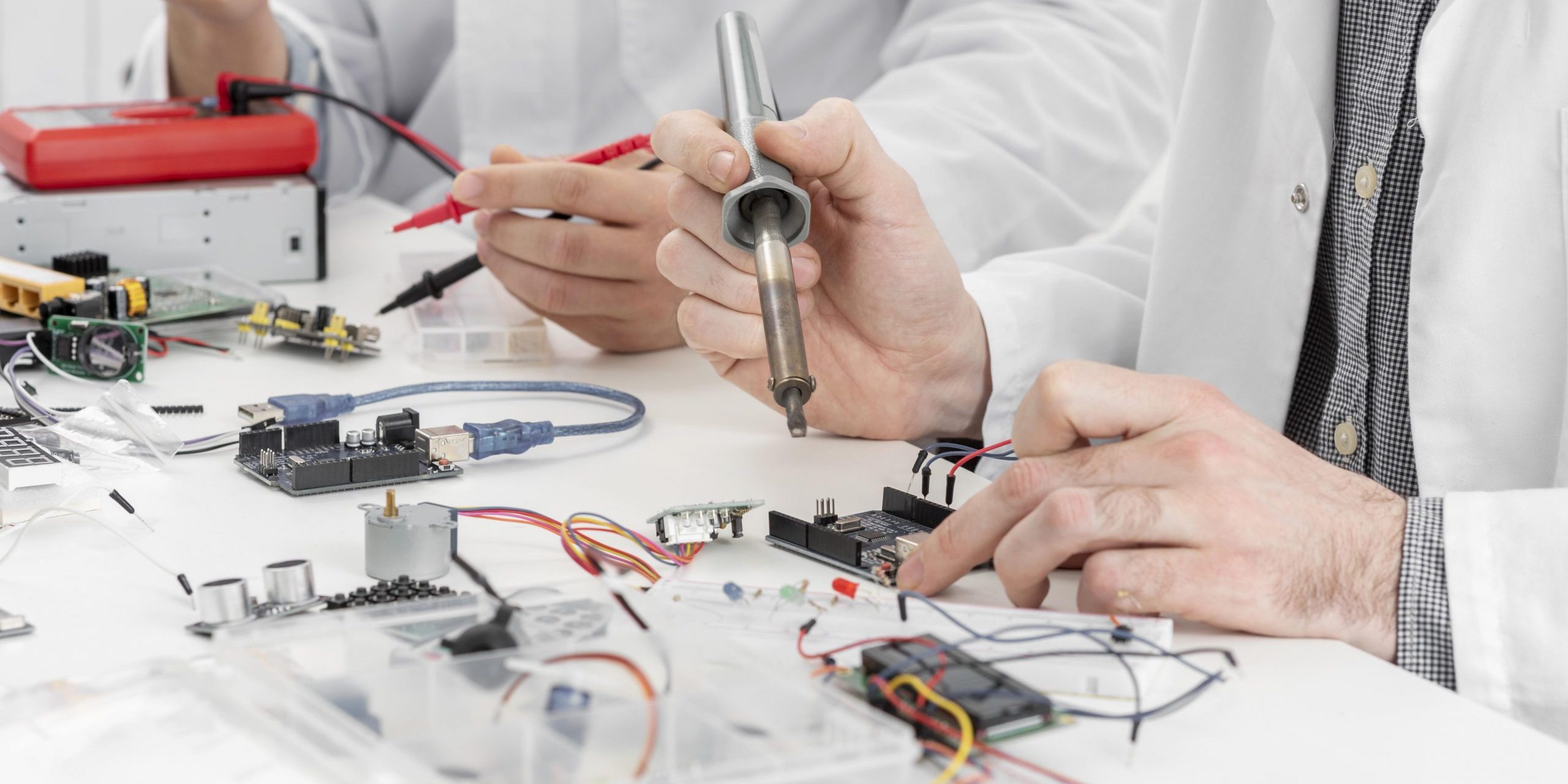 men-lab-doing-experiments-close-up